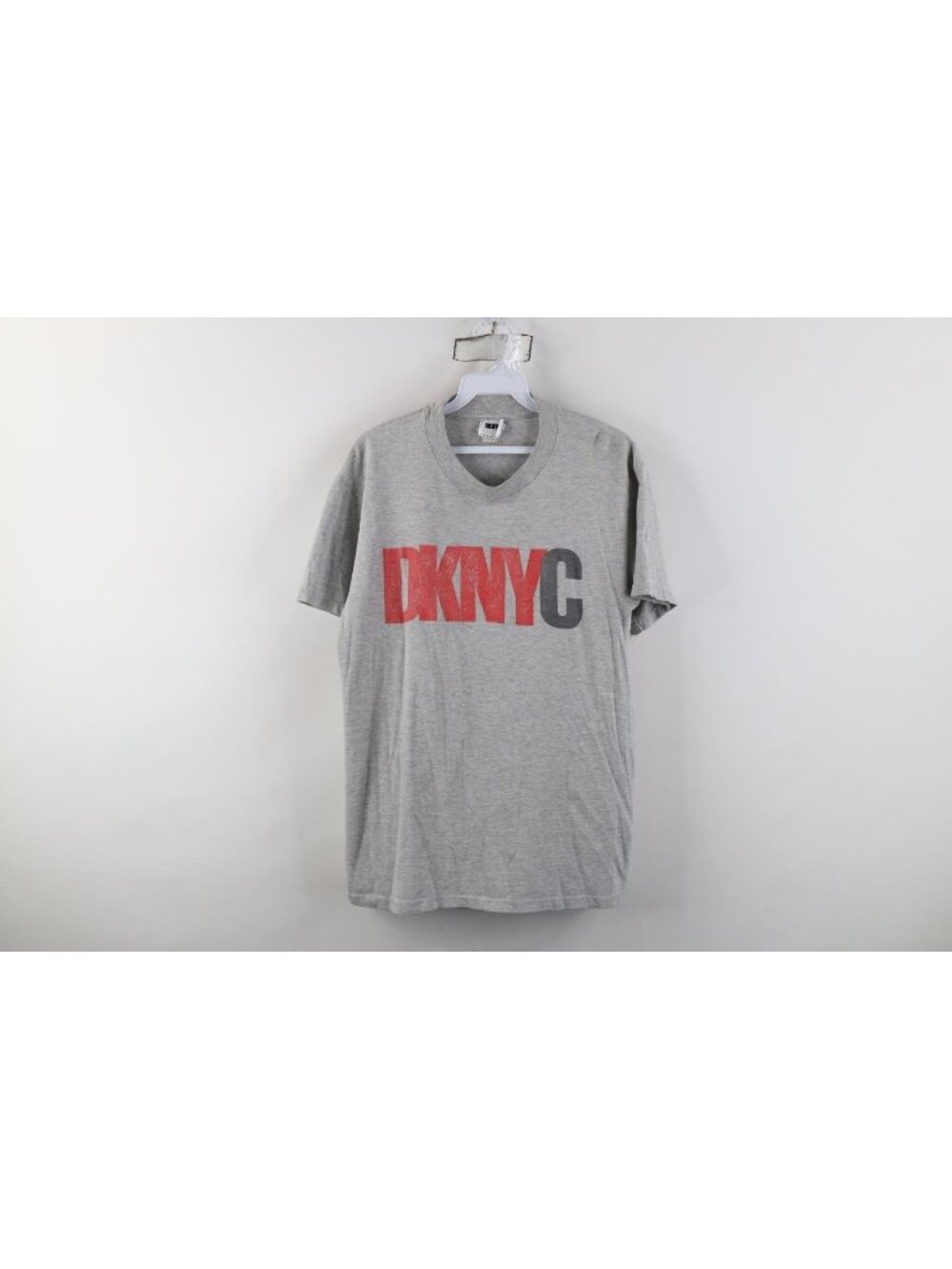 Vintage 90s DKNY Mens Medium Faded Spell Out NYC New York City T-Shirt Gray
